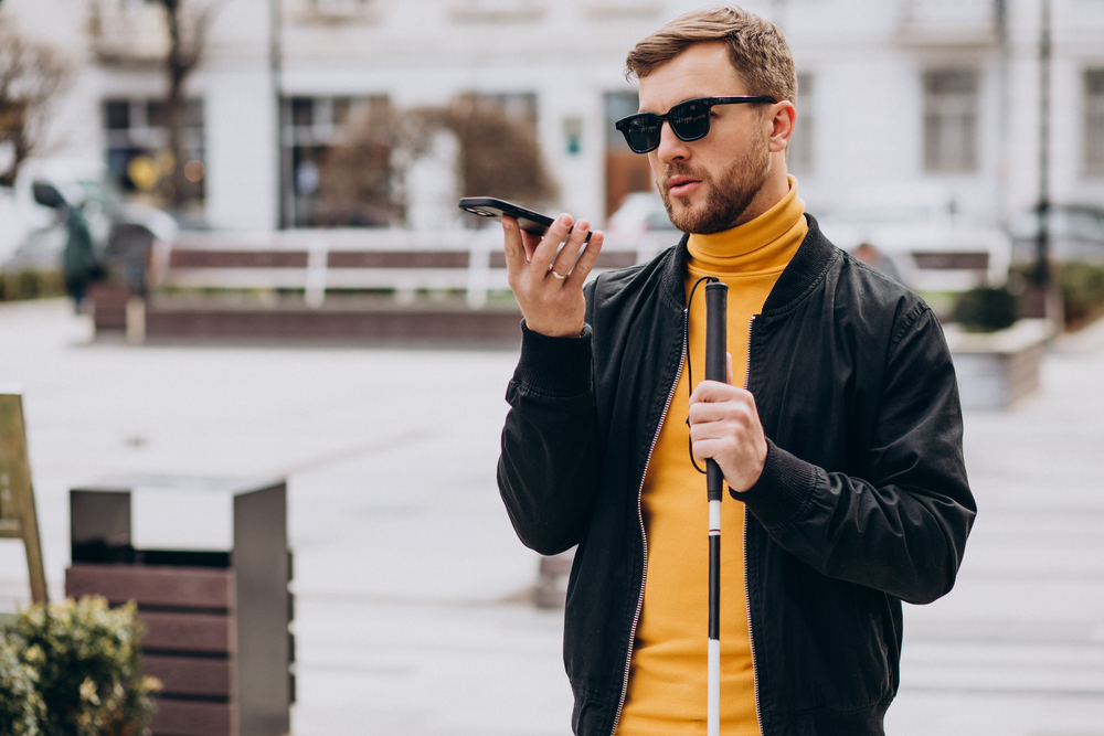 Young,Blinded,Man,Using,Phone,And,Sending,Voice,Message